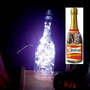 Lampe chevet fait avec une bouteille célébration